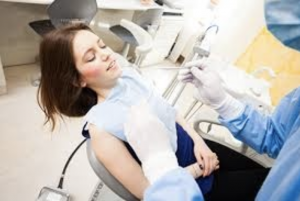 Girl getting dental check