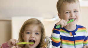 Kids brushing their teeth